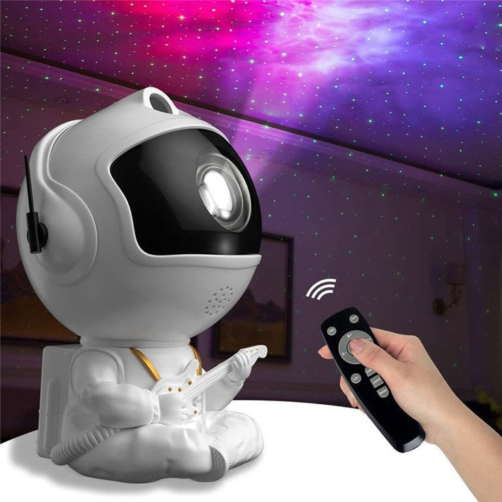 Mini Proyector Astronauta de Estrellas y Nebulosa 360º - Diseño de Estrella y Guitarra